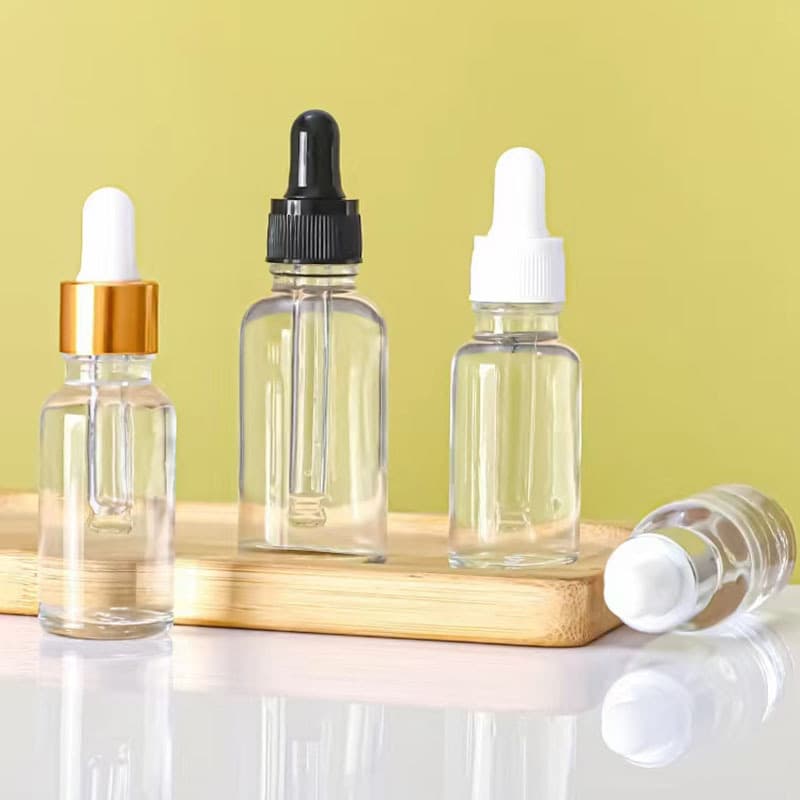 Clear Glass Boston Round Bottles With White Bulb Droppers thumbnail 5