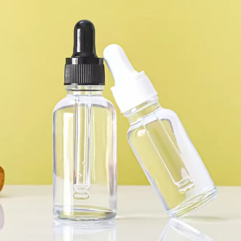 Clear Glass Boston Round Bottles With White Bulb Droppers