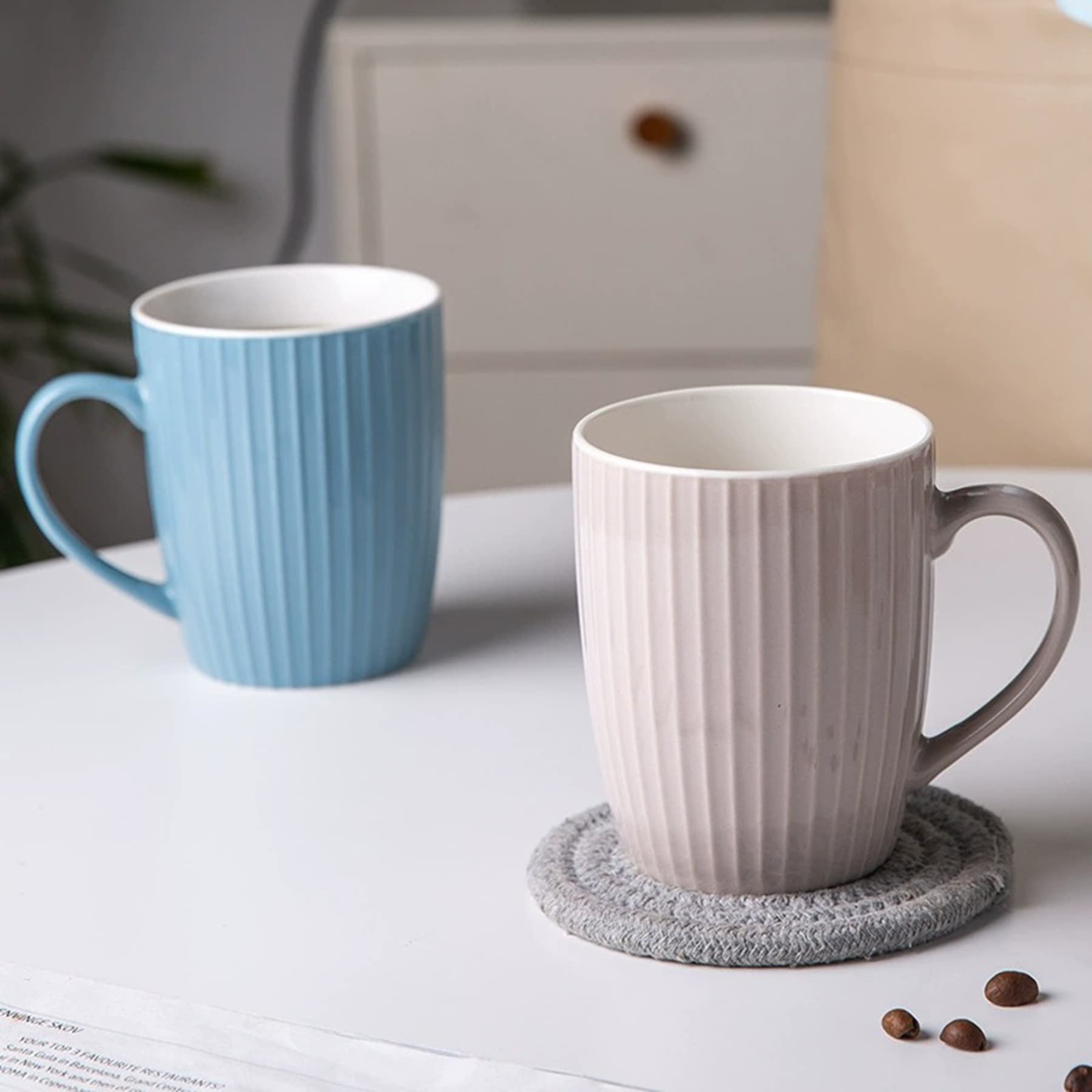 Ceramic mug with embossed stripes