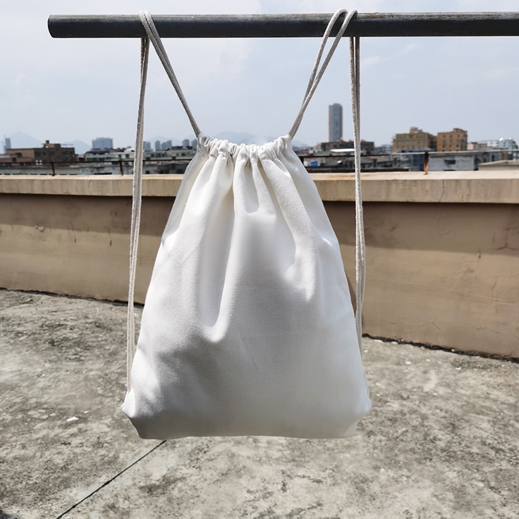 Drawstring canvas backpack two-tone design